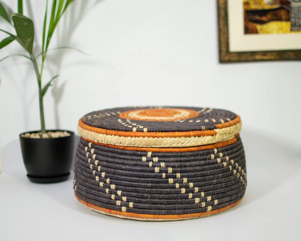 Obsidian Swirl woven basket with lid, 12-inch, handwoven natural seagrass and palm leaf