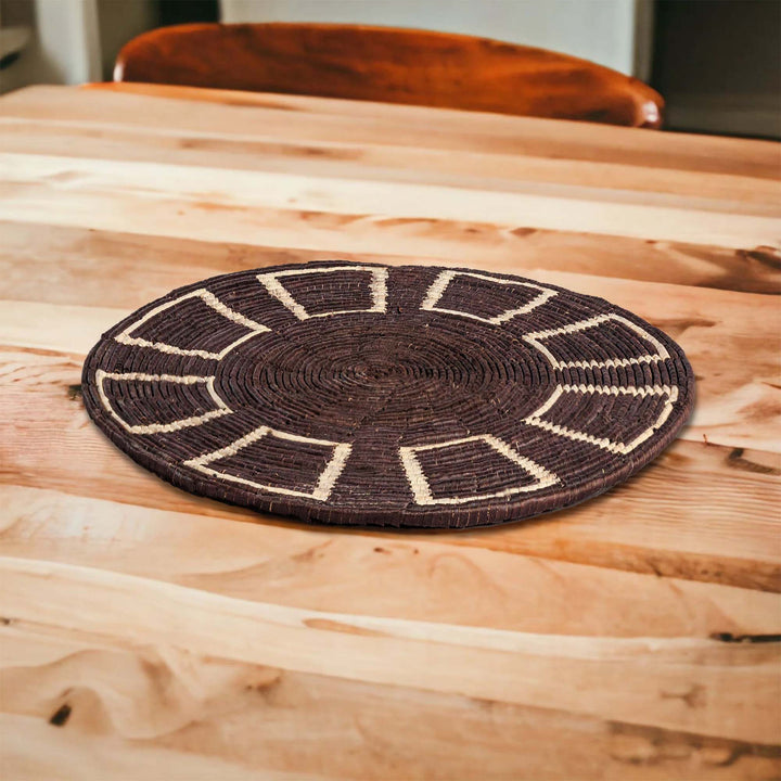 Black Obstract Hand Woven Mat, 14-inch Diameter and 0.1-inch Depth.