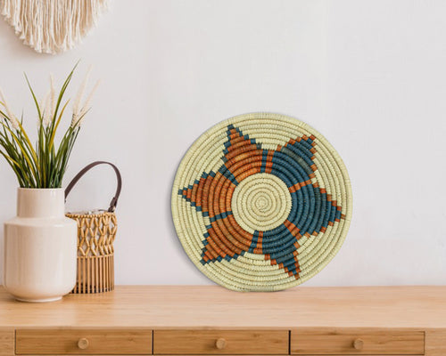 Noctiflora coiled woven wall art, 10-inch, handwoven natural palm leaf and straw