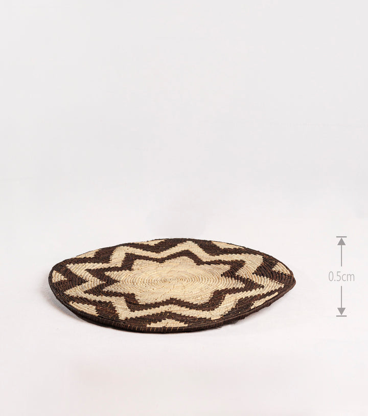 Eight Pyramid Black Hand-Woven Mat, 14-inch Diameter and 0.2-inch Depth.